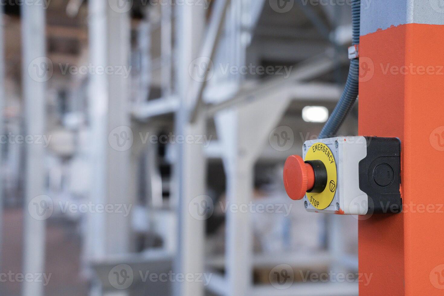 Emergency button in technical production photo