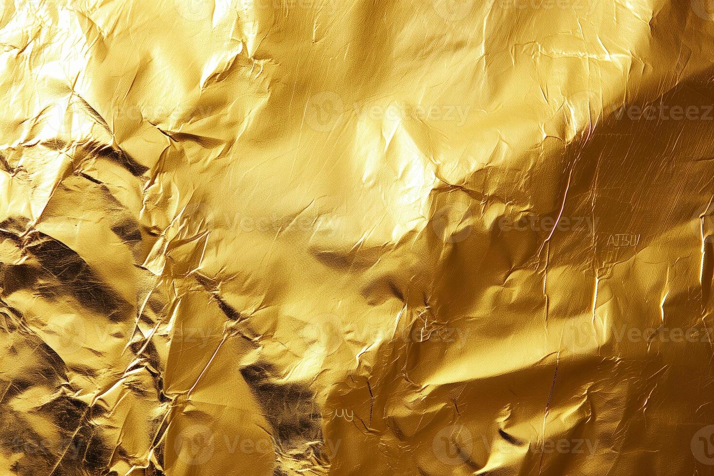 Gold foil texture Wrinkled gold foil texture background with a shiny metallic finish photo