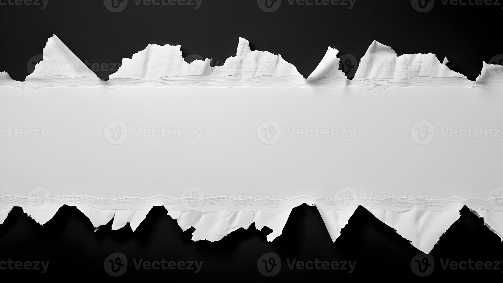 White ripped paper strips with torn edges isolated on a black background, perfect for design overlays photo
