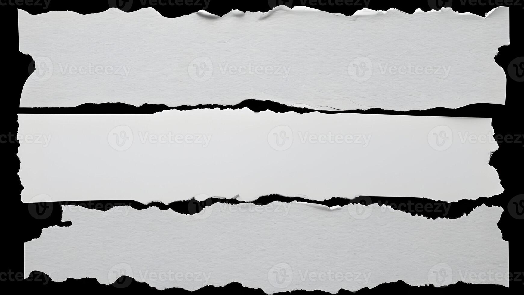 White ripped paper strips with torn edges isolated on a black background, perfect for design overlays photo