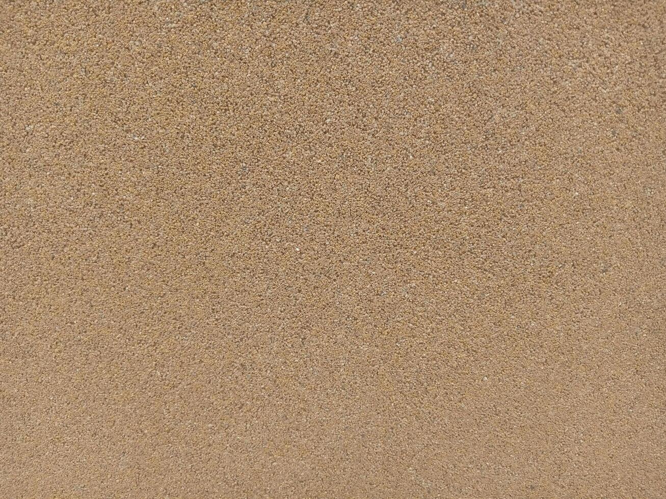 A brown surface with a few small spots photo