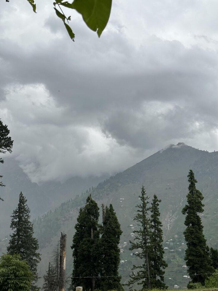 A view of the mountains from a hillside photo