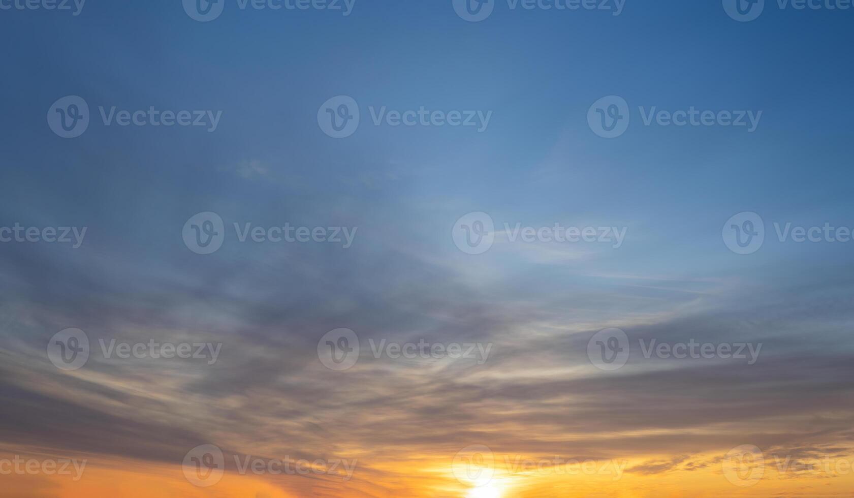 Dramatic sunset skies, cloudscape of rich color twilight sky. Sunset cloud background photo