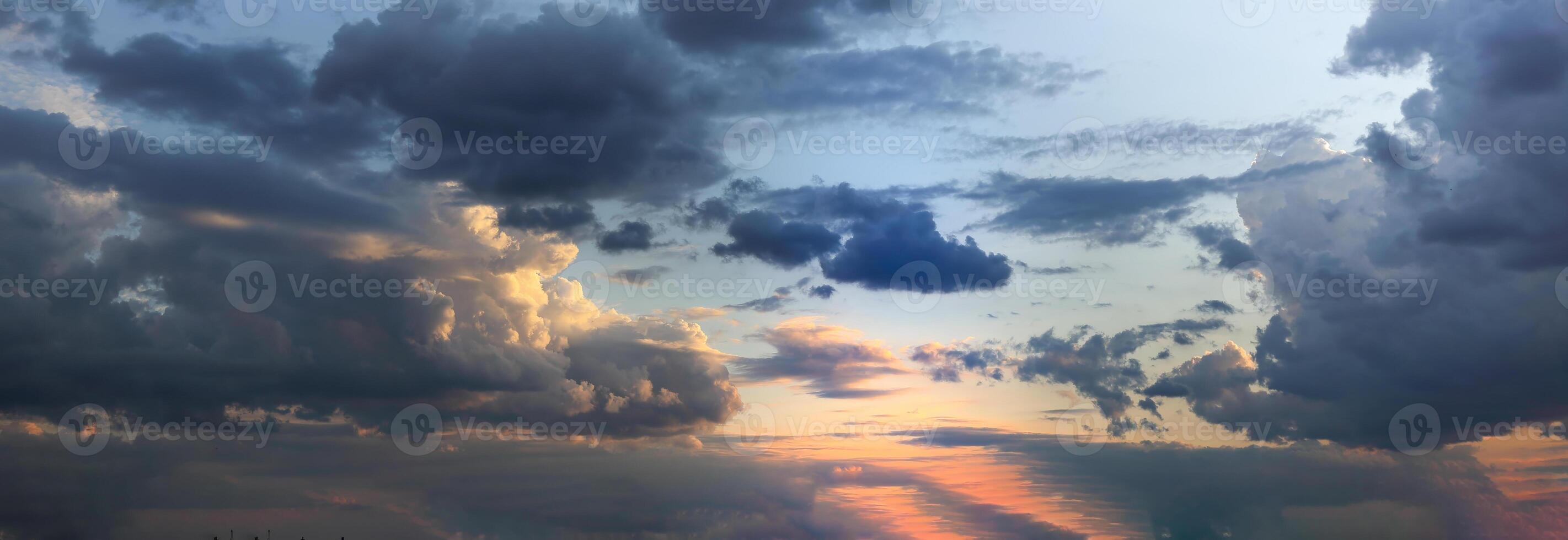 Dramatic sunset skies, cloudscape of rich color twilight sky. Sunset cloud background photo