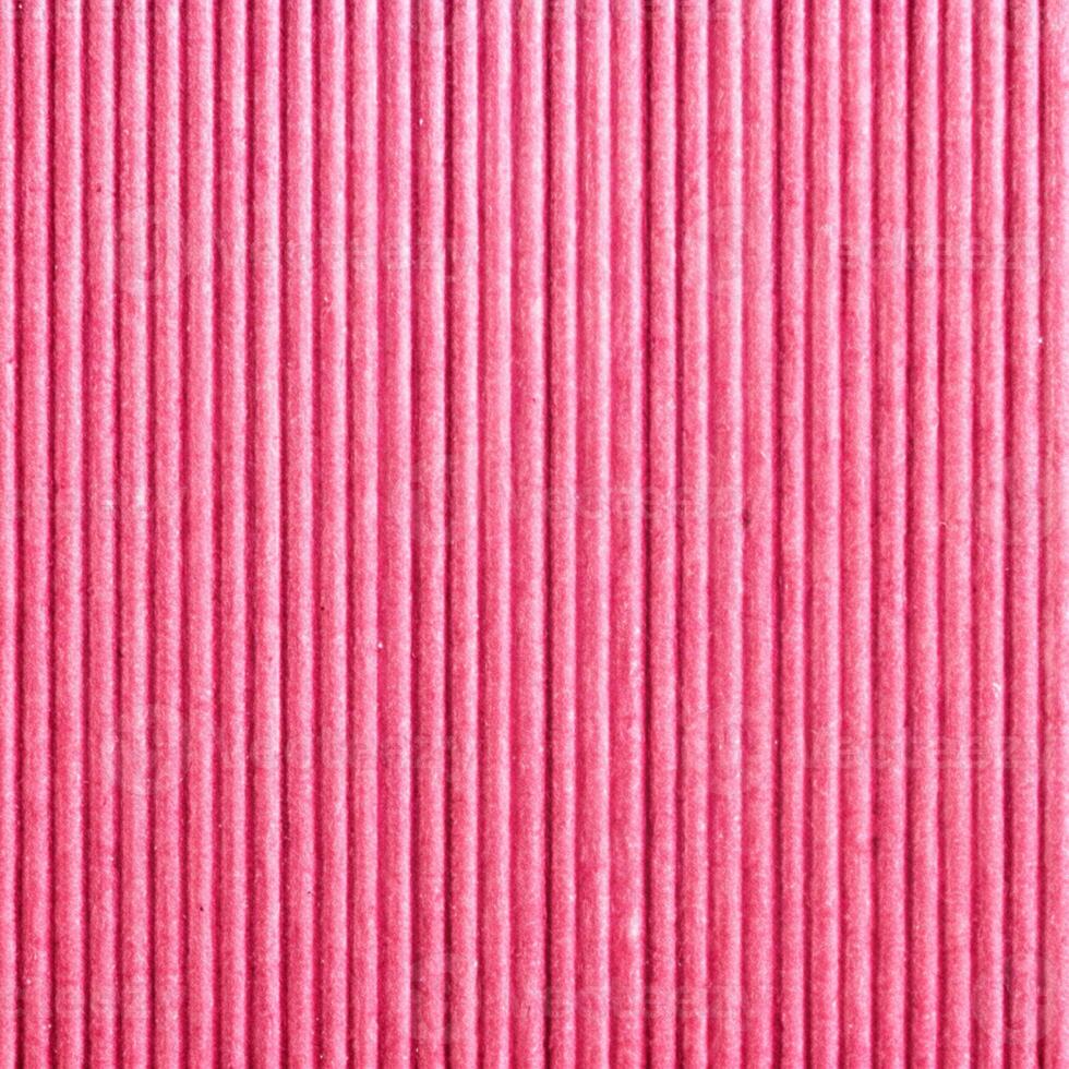 A pink paper background with vertical lines photo