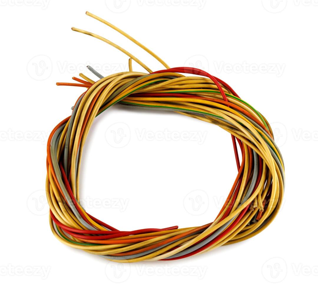 Close-up of multi-wire cables bundle plaited to circle isolated on white background. Colored wiring assembly of copper conductors with plastic insulation. photo