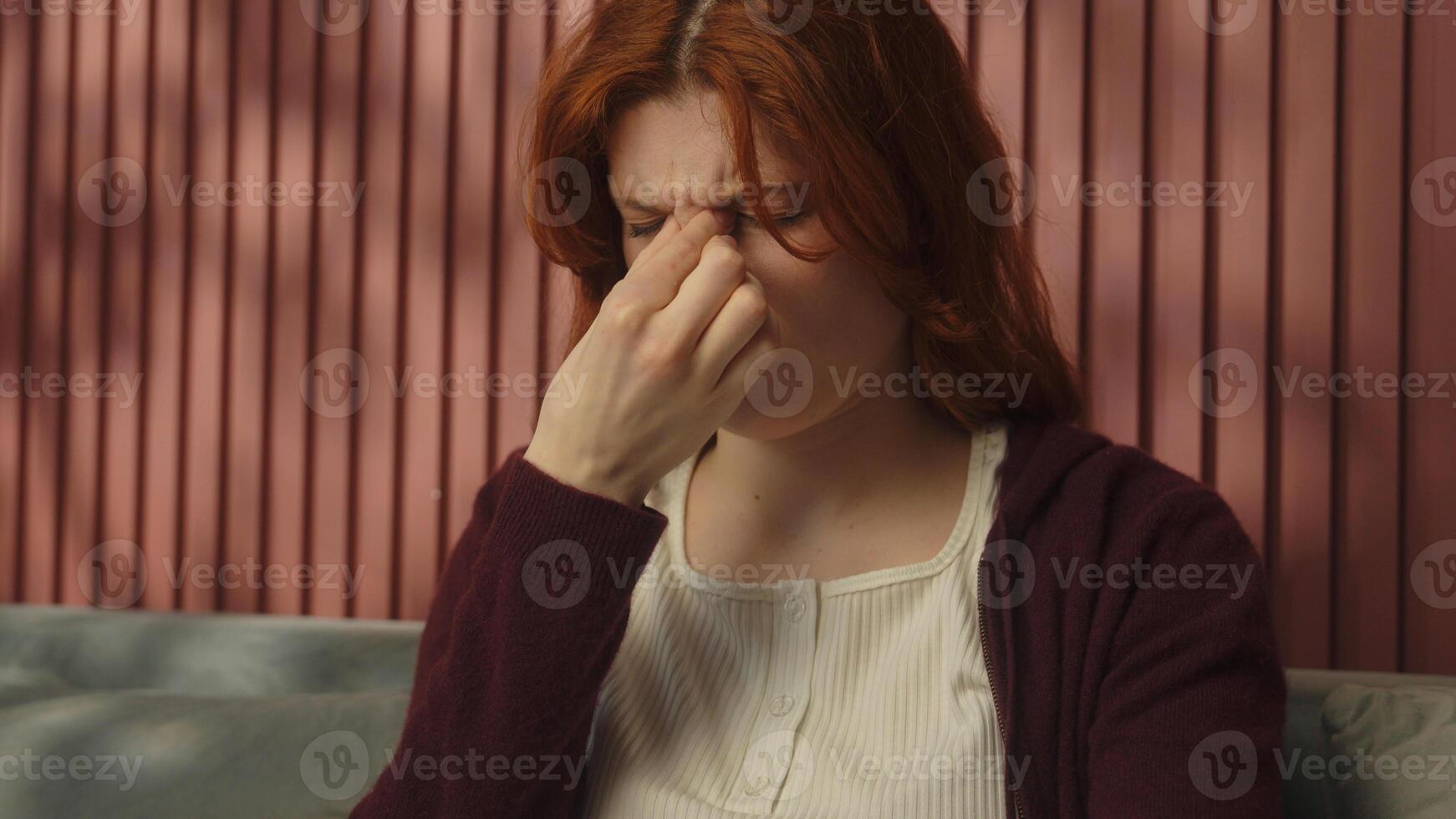 Unwell sad tired woman Caucasian girl female at home suffer migraine headache symptom pain touch head eyes strain health problem sick lady worried influenza fever hurt medicine healthcare insurance photo