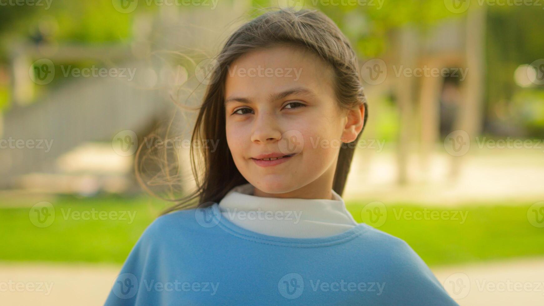 Portrait little girl child adopt kid innocence face adorable daughter smiling happy schoolgirl pupil school student in park city outdoors looking at camera health insurance pediatric custody childhood photo