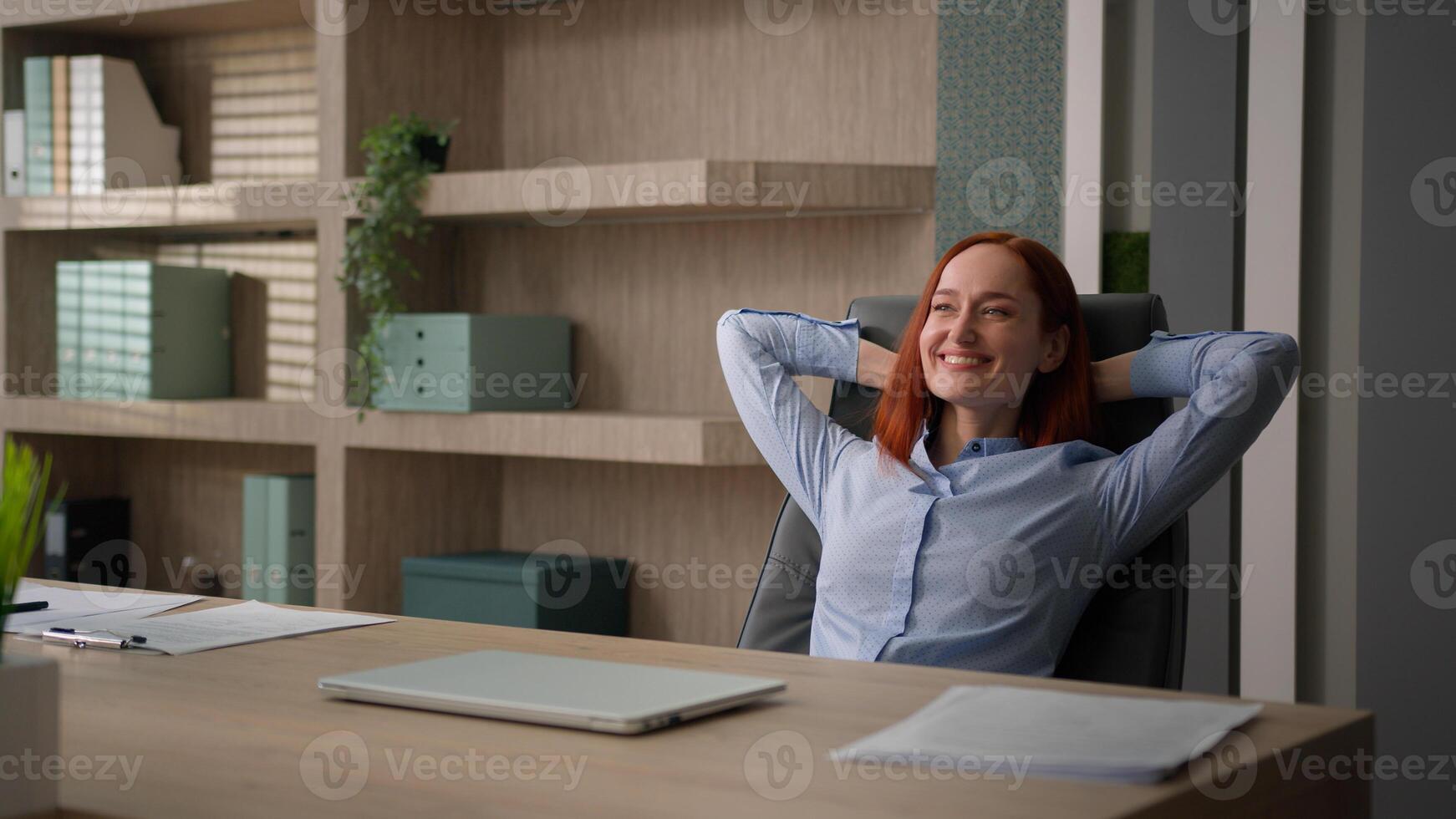 Smiling Caucasian business office worker girl woman satisfied businesswoman student finished computer work close laptop accomplish online task end job done stretching relaxing project accomplishment photo