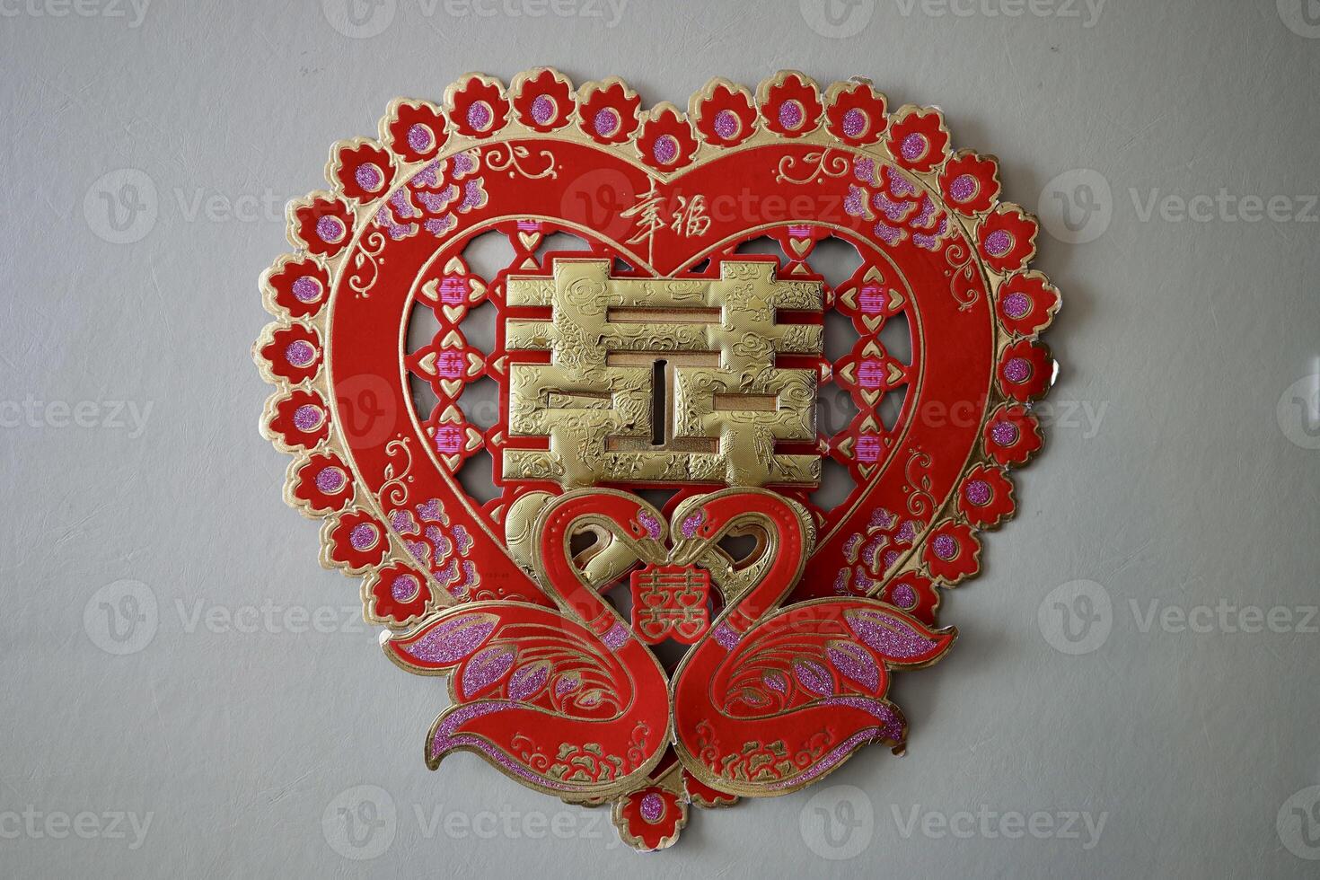 Chinese Character sometimes translated as Double Happy, is a Chinese traditional ornament design, commonly used as a decoration symbol of marriage. photo
