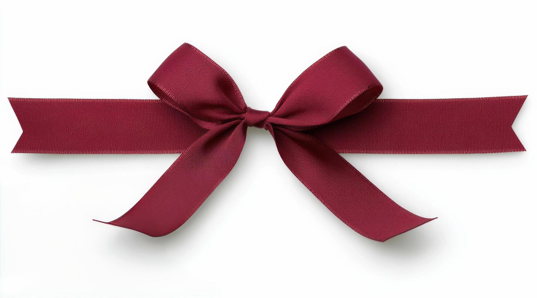 Elegant red ribbon displayed on a white background for gift wrapping or decoration projects photo
