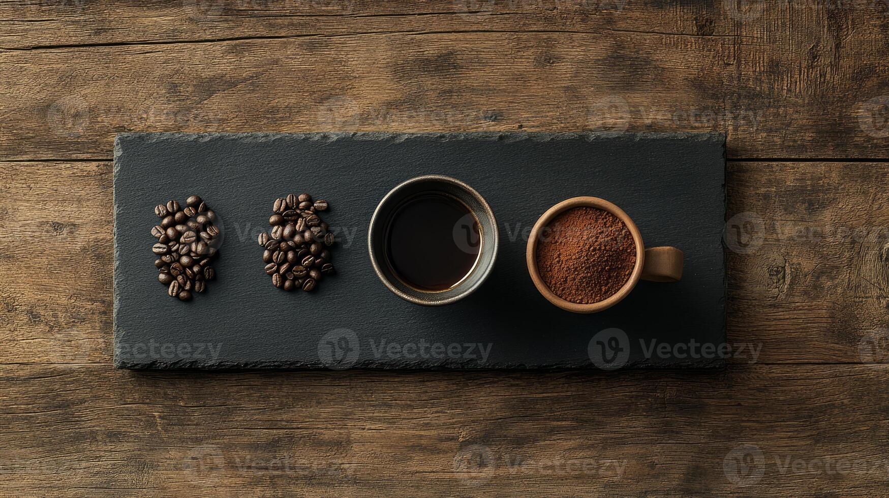Coffee beans and a cup of coffee on a wooden table photo