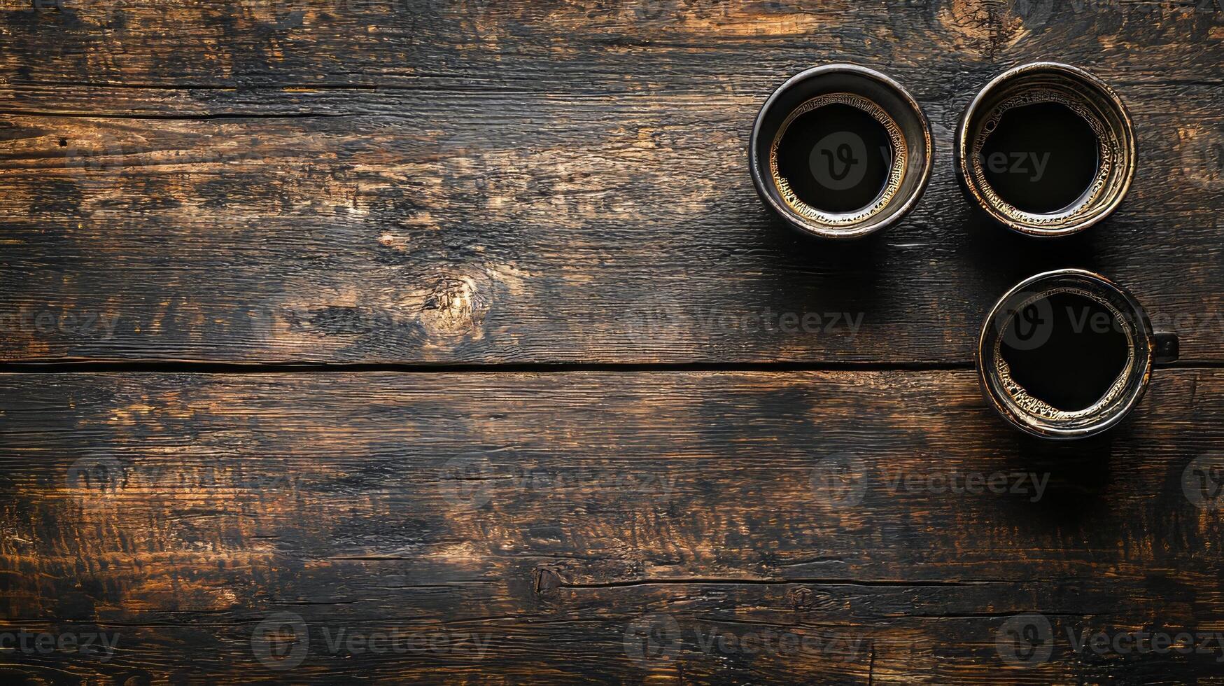 Two coffee cups on a wooden table photo