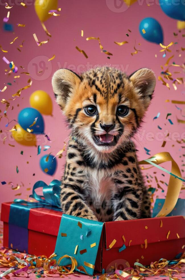 A playful cheetah cub sits in a colorful gift box surrounded by festive decorations. photo