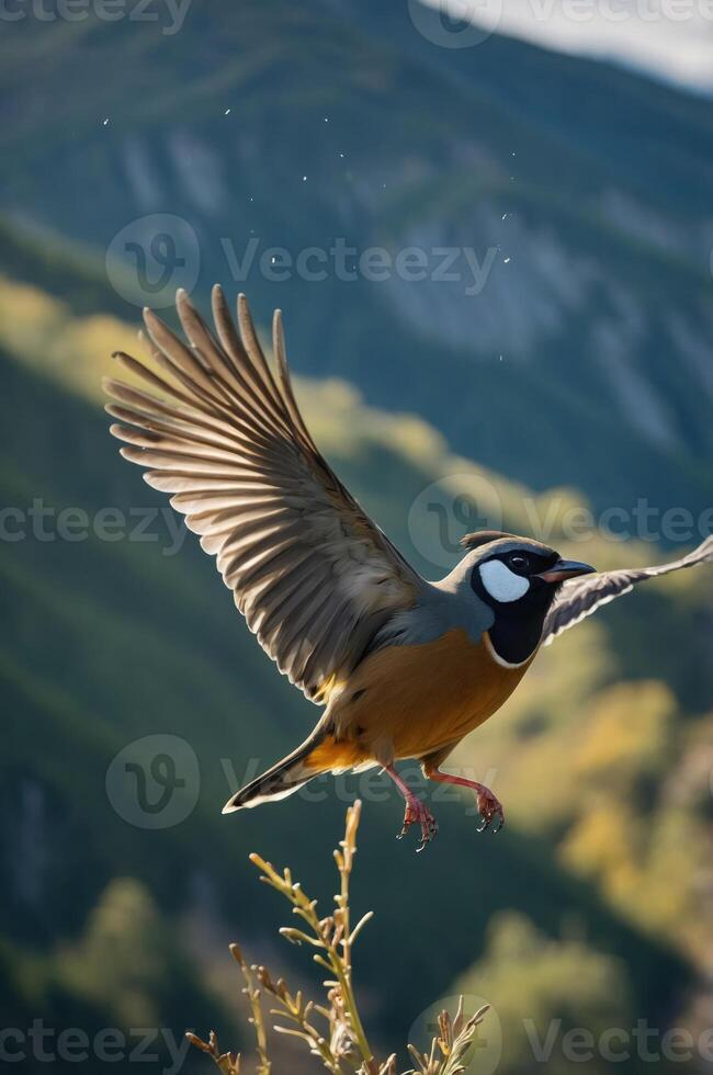 A bird in mid-flight against a blurred mountainous background. photo