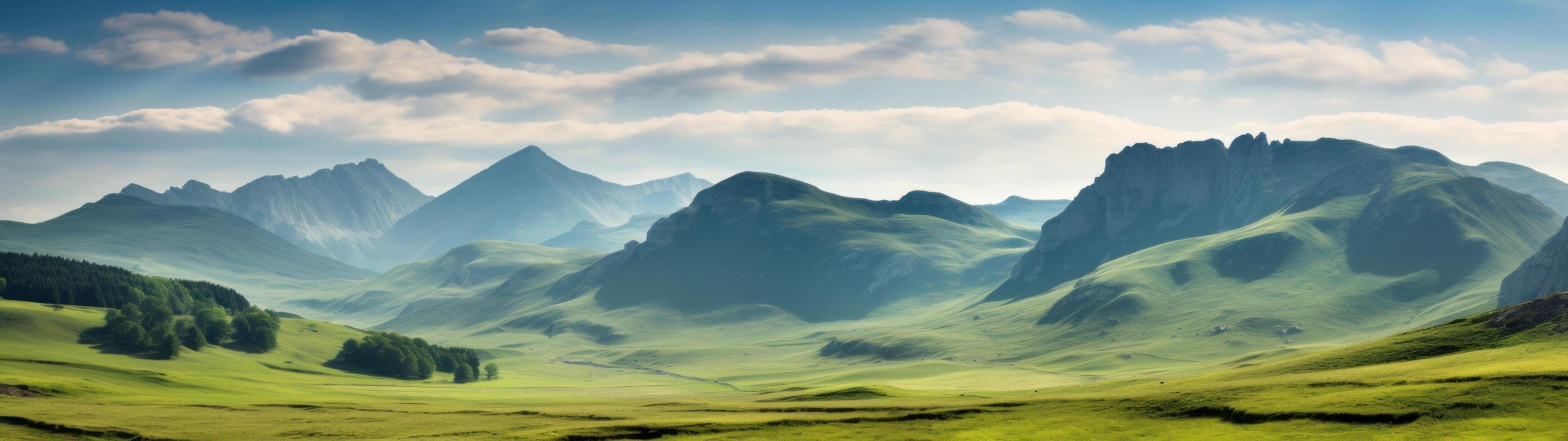 Majestic mountain landscape with rolling hills and lush greenery photo