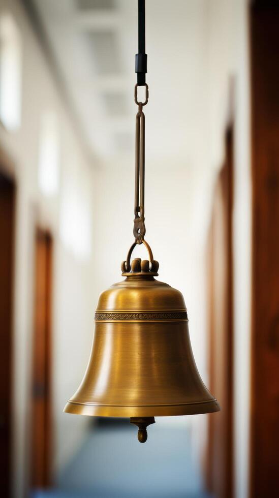 Antique Brass Bell Hanging in Hallway photo