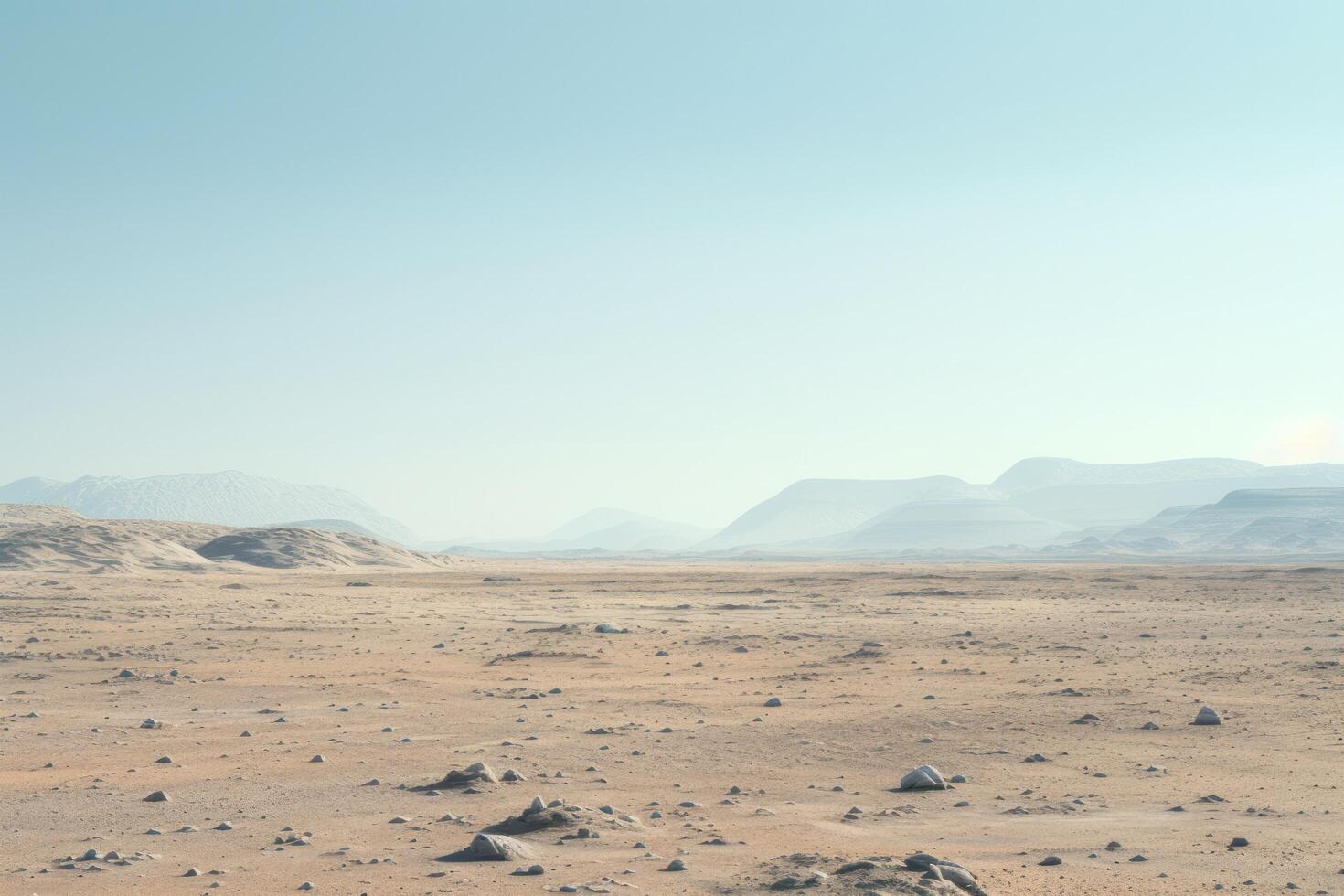 Vast desert landscape with mountains in the distance photo