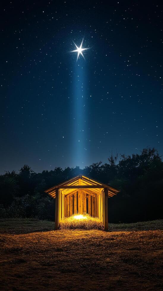 Starry night over a rustic shelter with hay under a glowing light in the countryside photo
