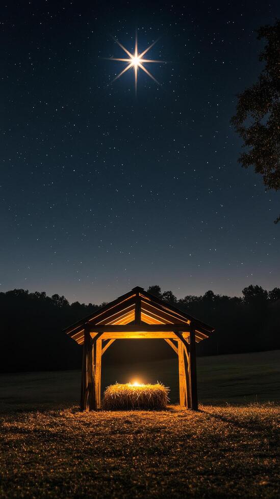 Starry night over a rustic shelter with hay under a glowing light in the countryside photo
