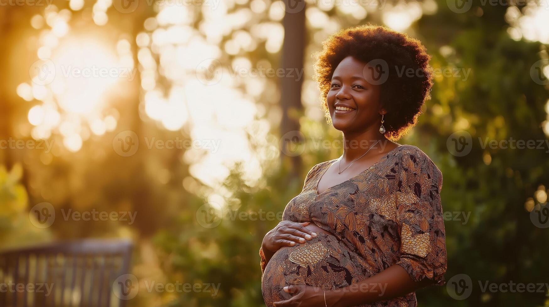 Confident pregnant african woman outdoors in sunlit garden, embracing natural beauty photo