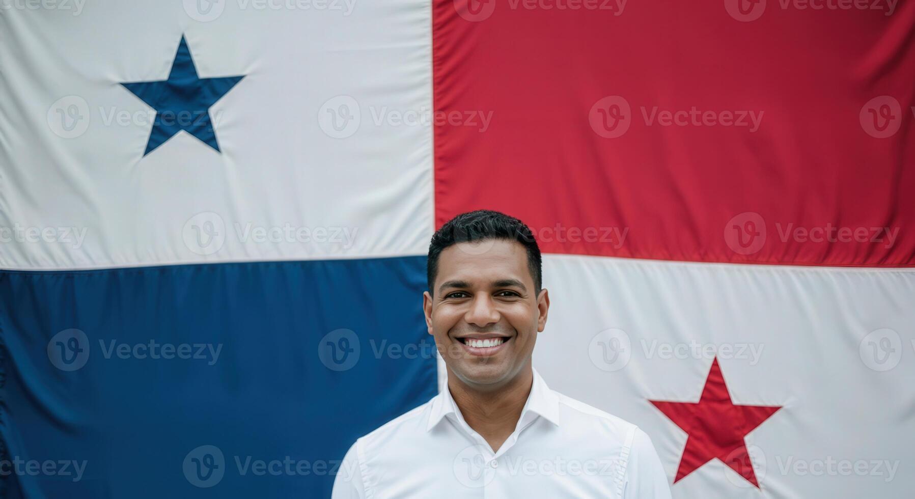 Portrait of smiling male in front of panamanian flag for cultural celebration, marketing, and editorial use photo