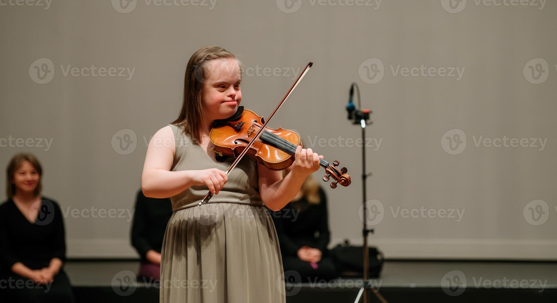 Diverse musical performance, a young violinist shines on stage photo
