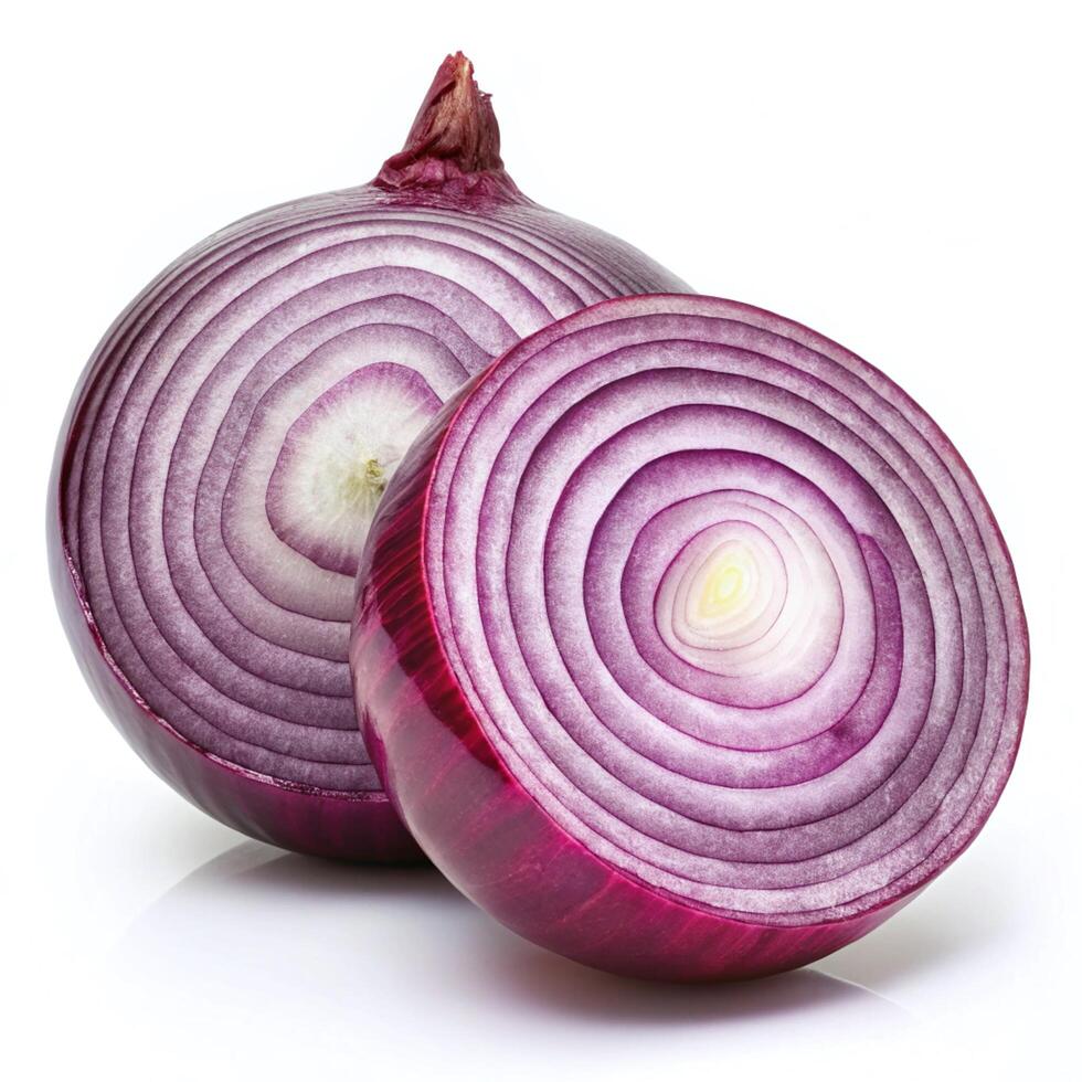 A halved red onion reveals its concentric rings, showcasing its vibrant purple hues. photo