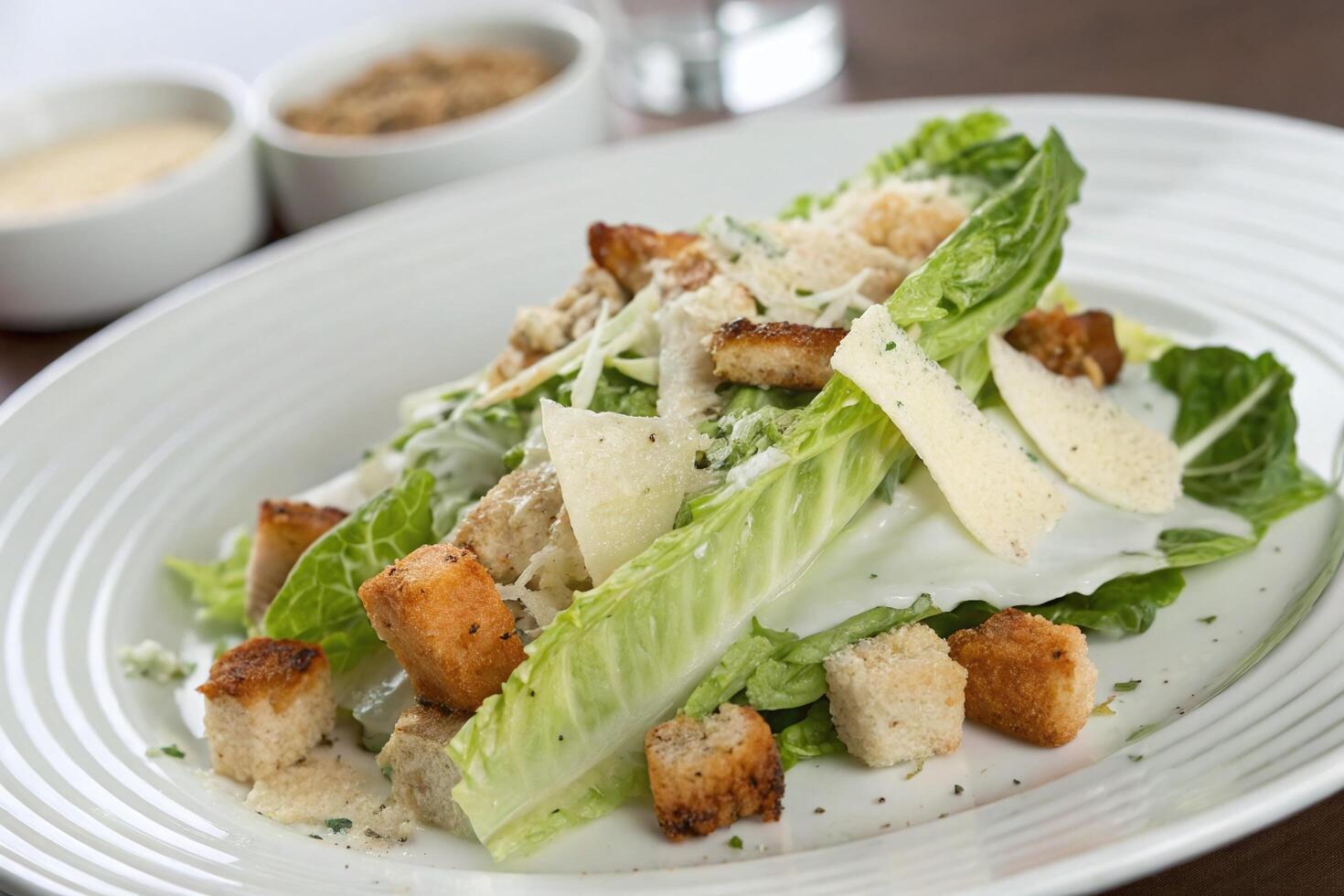 A Delicious Caesar Salad with Crispy Croutons and Parmesan Cheese photo