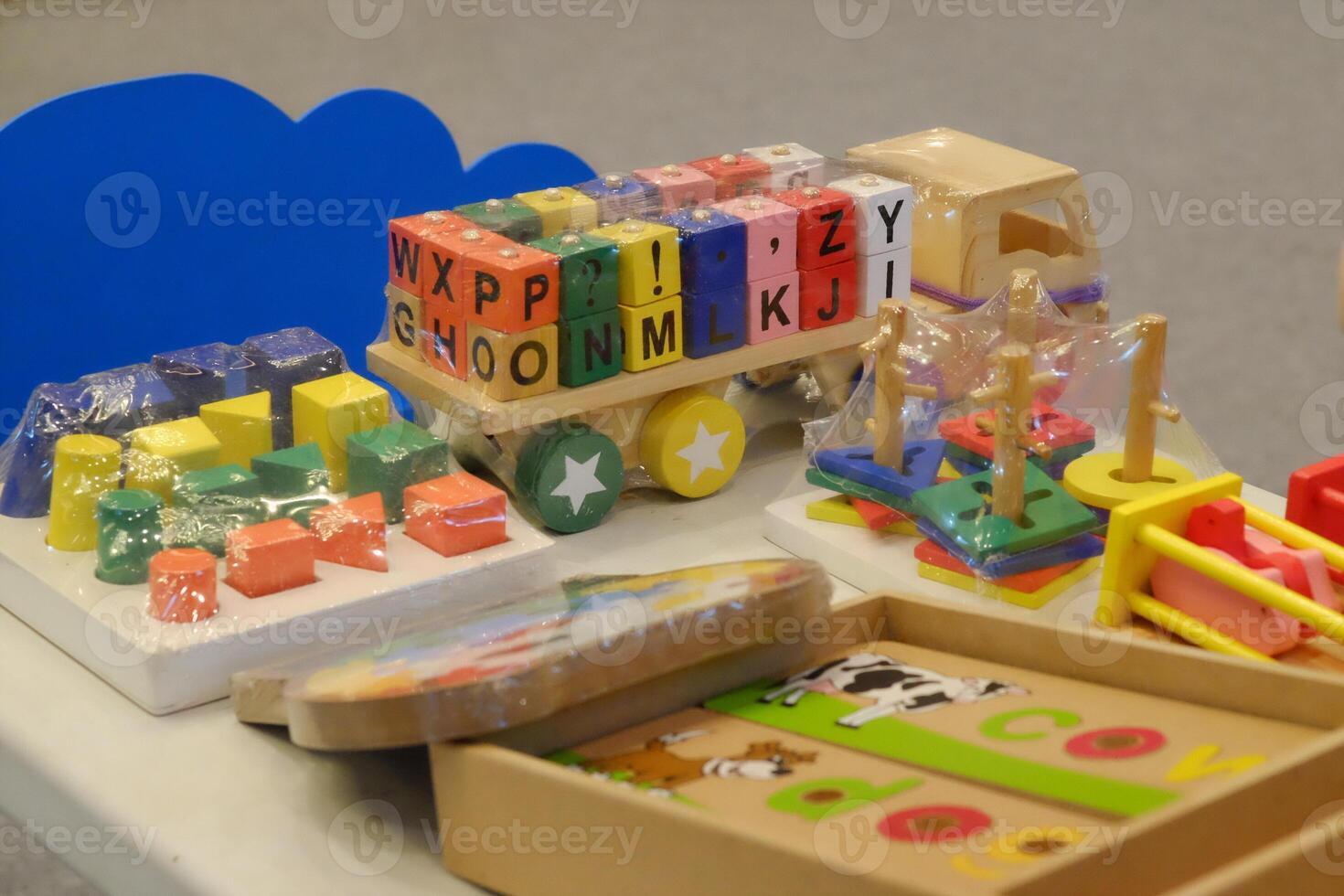 A vibrant array of wooden toys designed to enhance children's learning through play, promoting creativity and cognitive development. photo