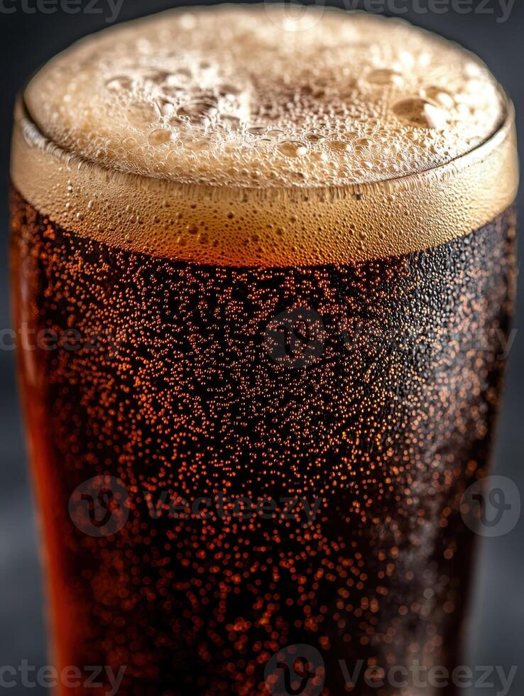 Close up of a frothy beer glass photo