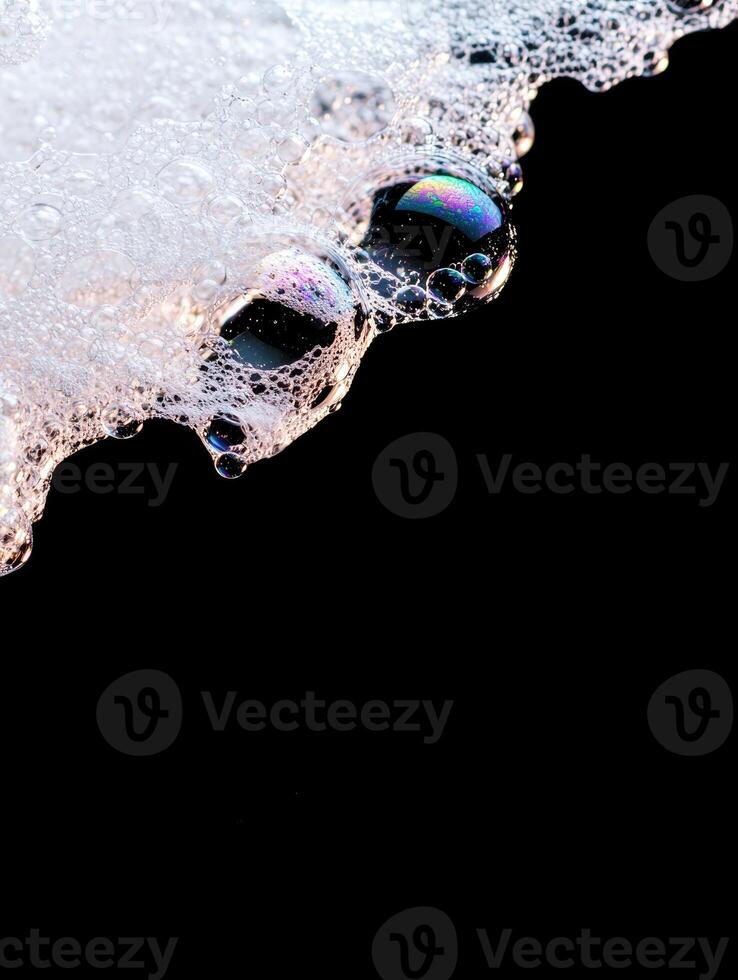 Colorful water droplets on a dark background photo