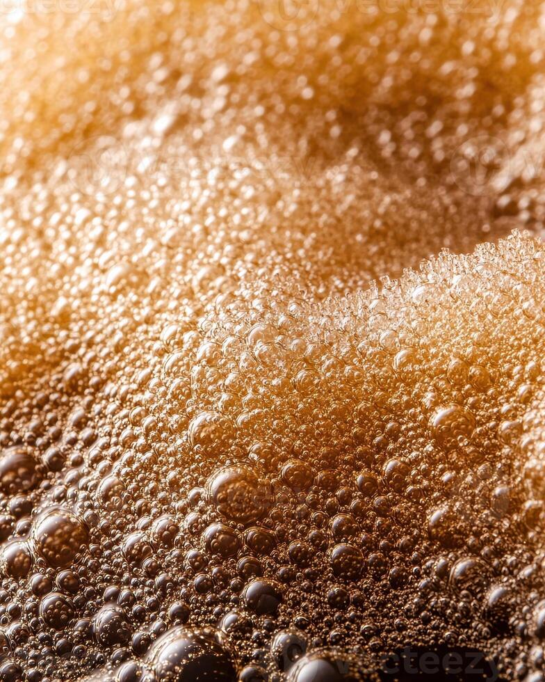 Sparkling golden bubbles abstract background photo