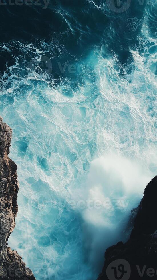 Water spraying from a cliff face toward a basin below , photorealistic wallpaper photo