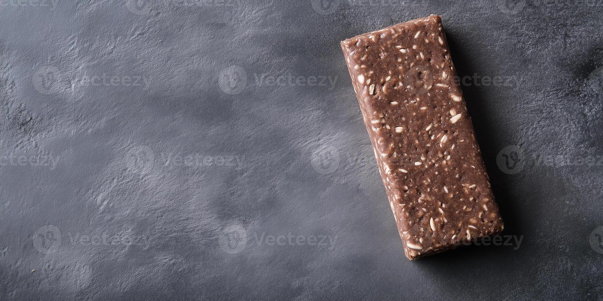 Protein bar on a flat surface with a smooth appearance, photorealistic food photo