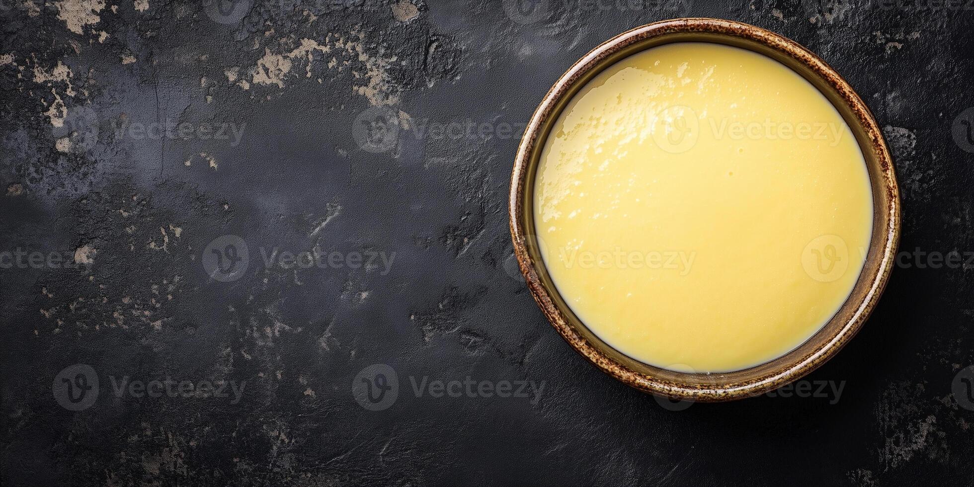 Custard set in a shallow bowl with even surface, no decorative elements, gastronomy photography photo