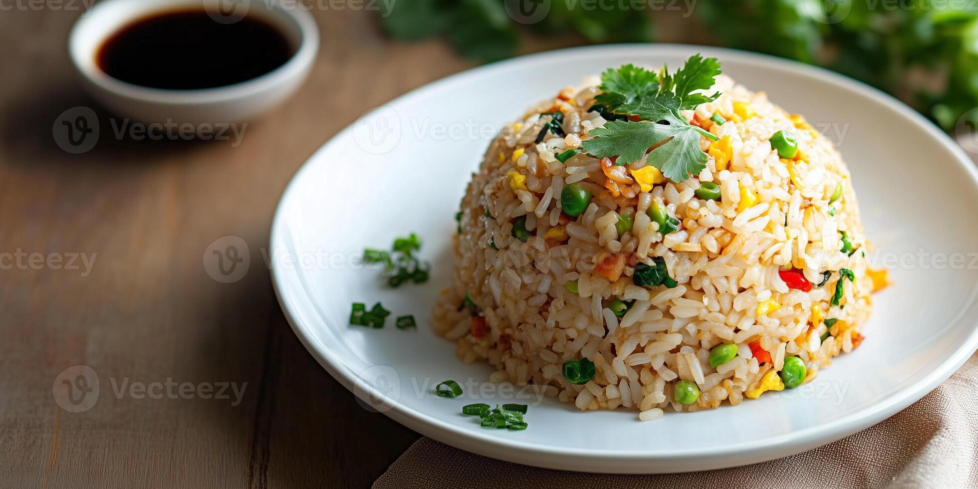 Fried rice placed on a white plate with garnish and soy sauce, photorealistic food photo