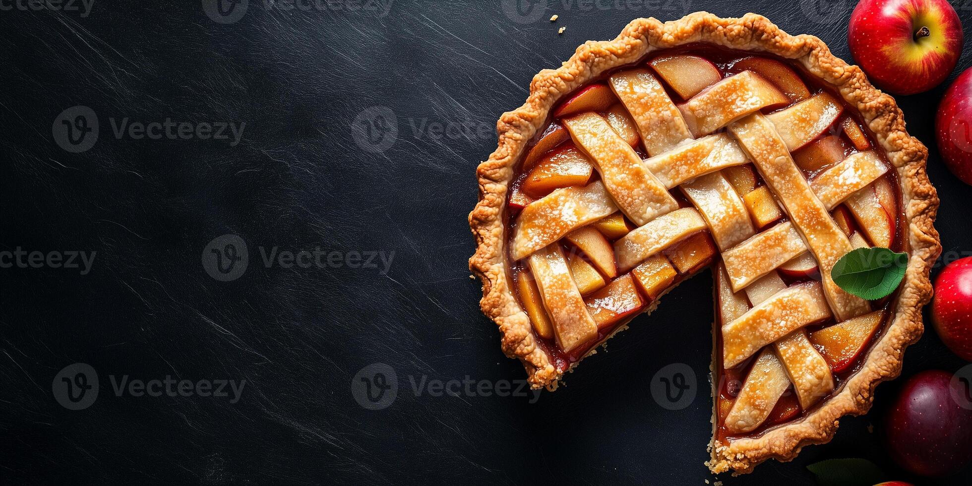 Slice of pie revealing layers of baked apples within a firm, flaky crust, food setting photo