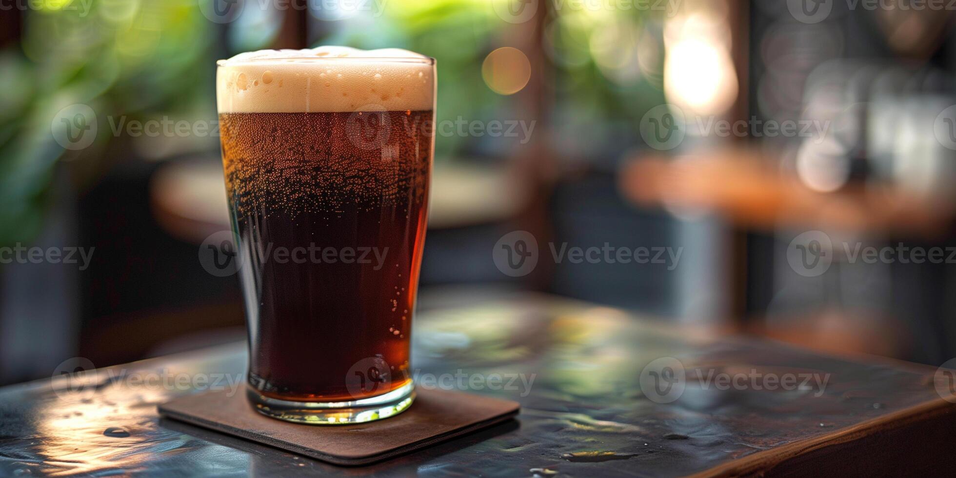 Glass of nitro coffee with bubbles and foam on a table next to a coaster, culinary photography photo