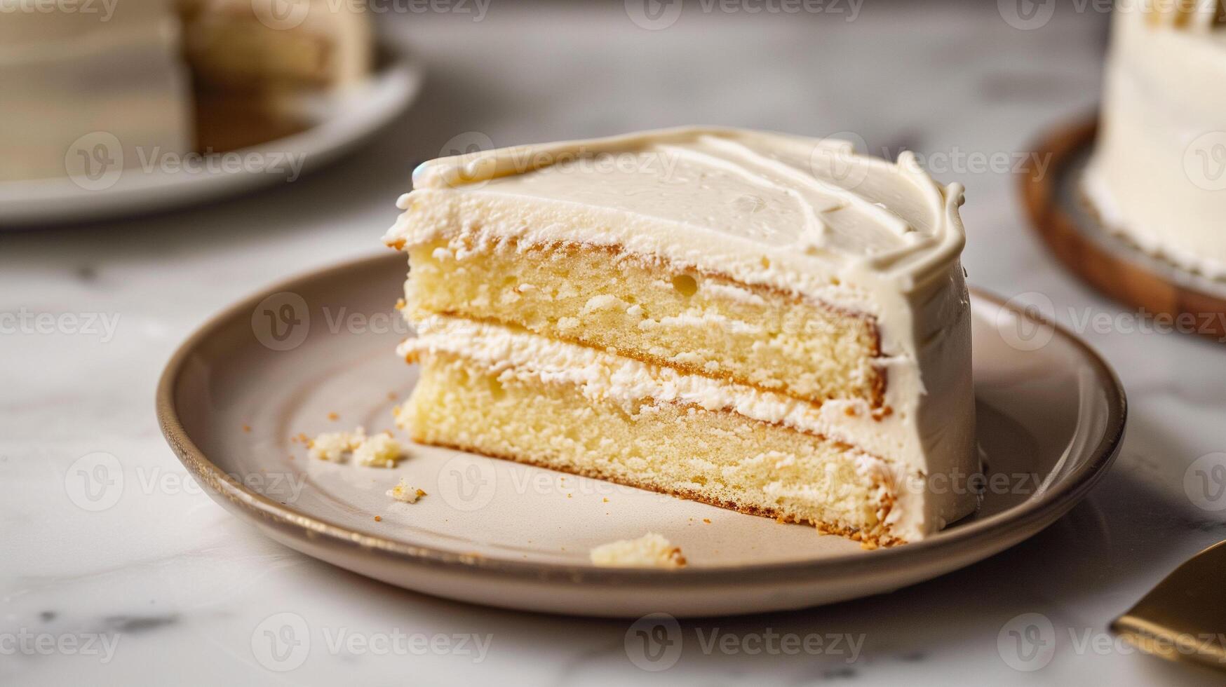 Whole cake with thin icing layer on a simple plate and a visible slice cut out, food photography photo