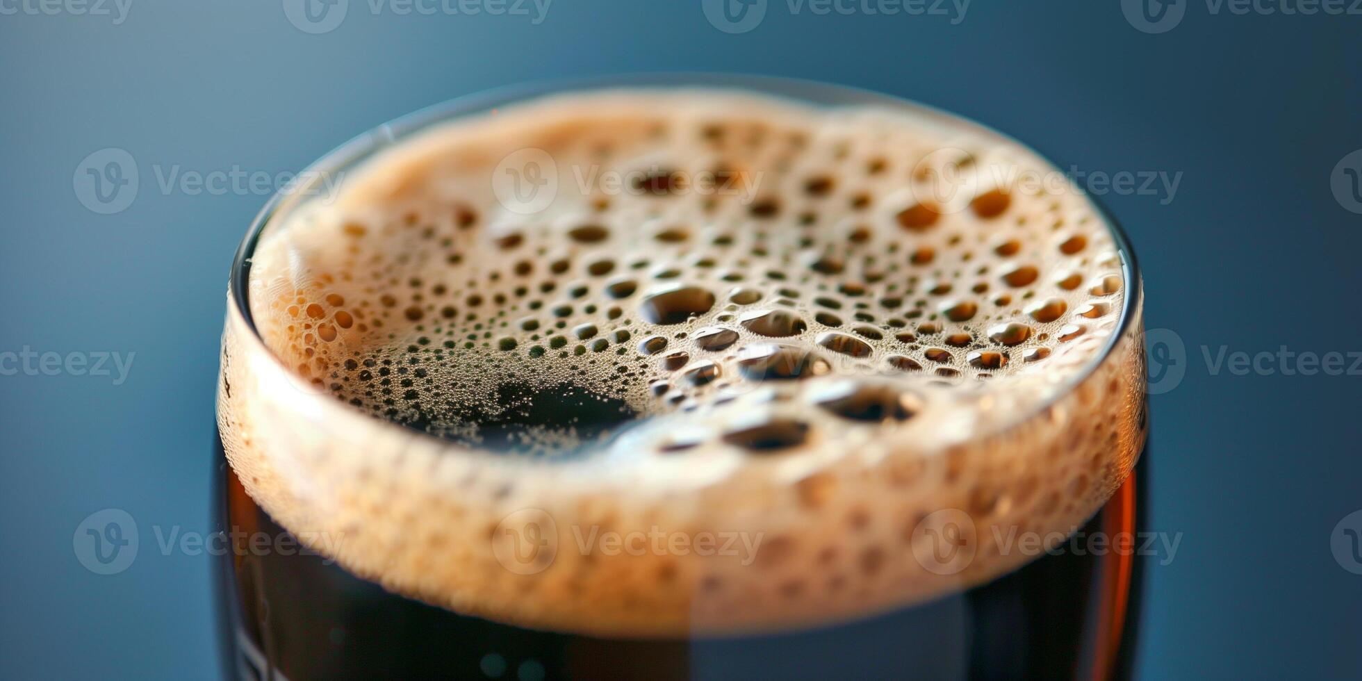 Close-up shot of a stout beer's creamy head in a clear pint glass, gastronomy photography photo