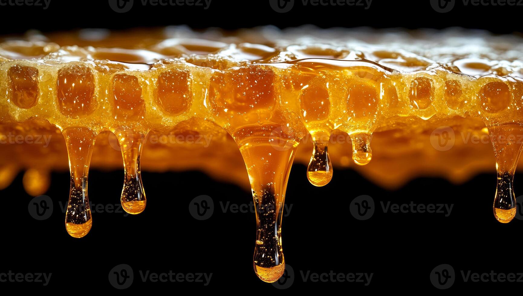 Honey drips from the comb at harvest. Honeycomb glistens under light as golden honey drips down, showcasing the beauty of fresh honey collection. photo