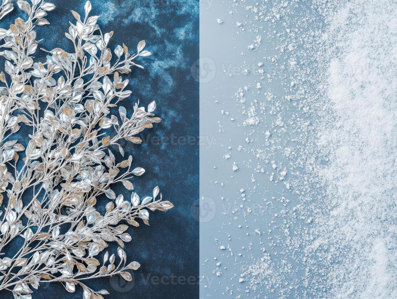 Elegant Silver and Blue Christmas Foliage with Scattered Snow on the Left Side and a Blank Right Side Ideal for Holiday Themed Text and Designs photo