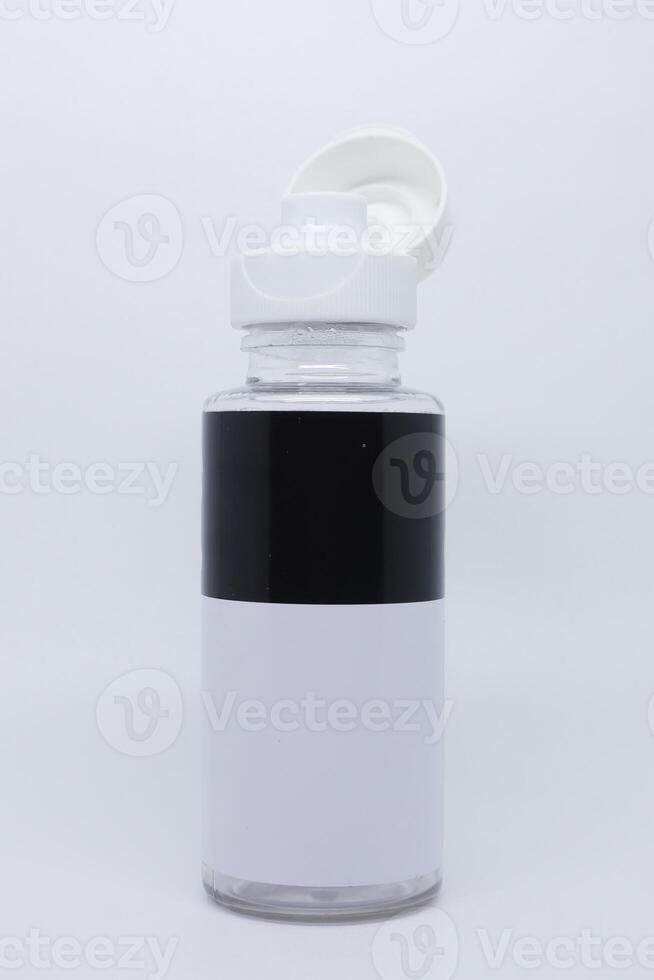 A white and black water bottle with a lid photo