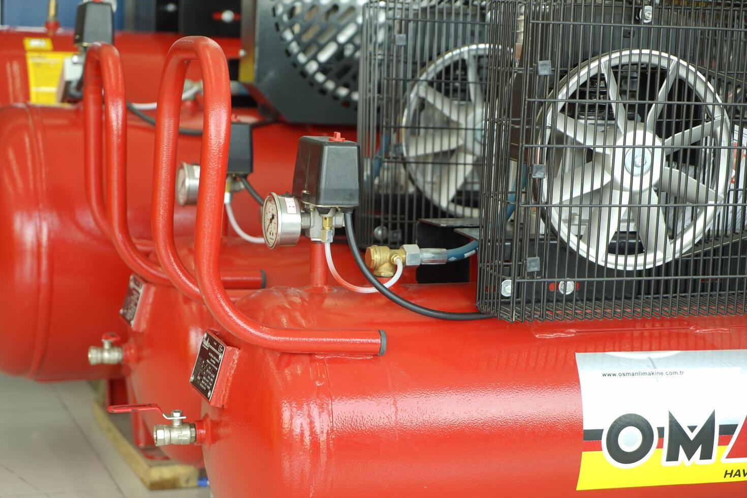 BAKU, AZERBAIJAN - May 20, 2022. Electrical equipment, high-pressure devices for washing cars by Omax are on sale in the store photo