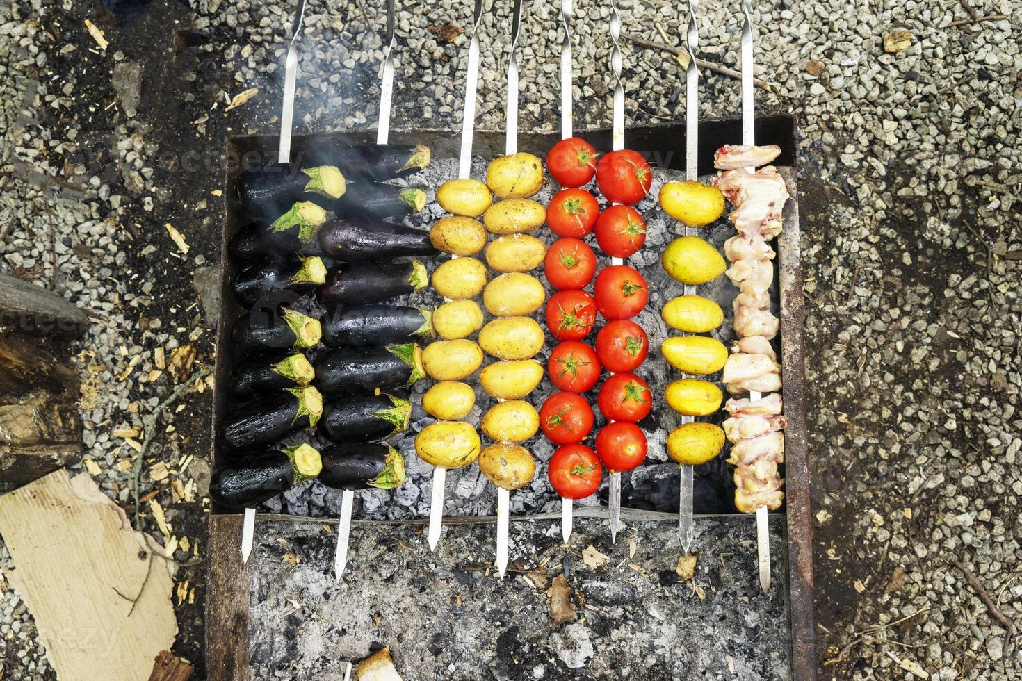 delicious grilled vegetables ,mushrooms, tomato, zucchini, potato photo