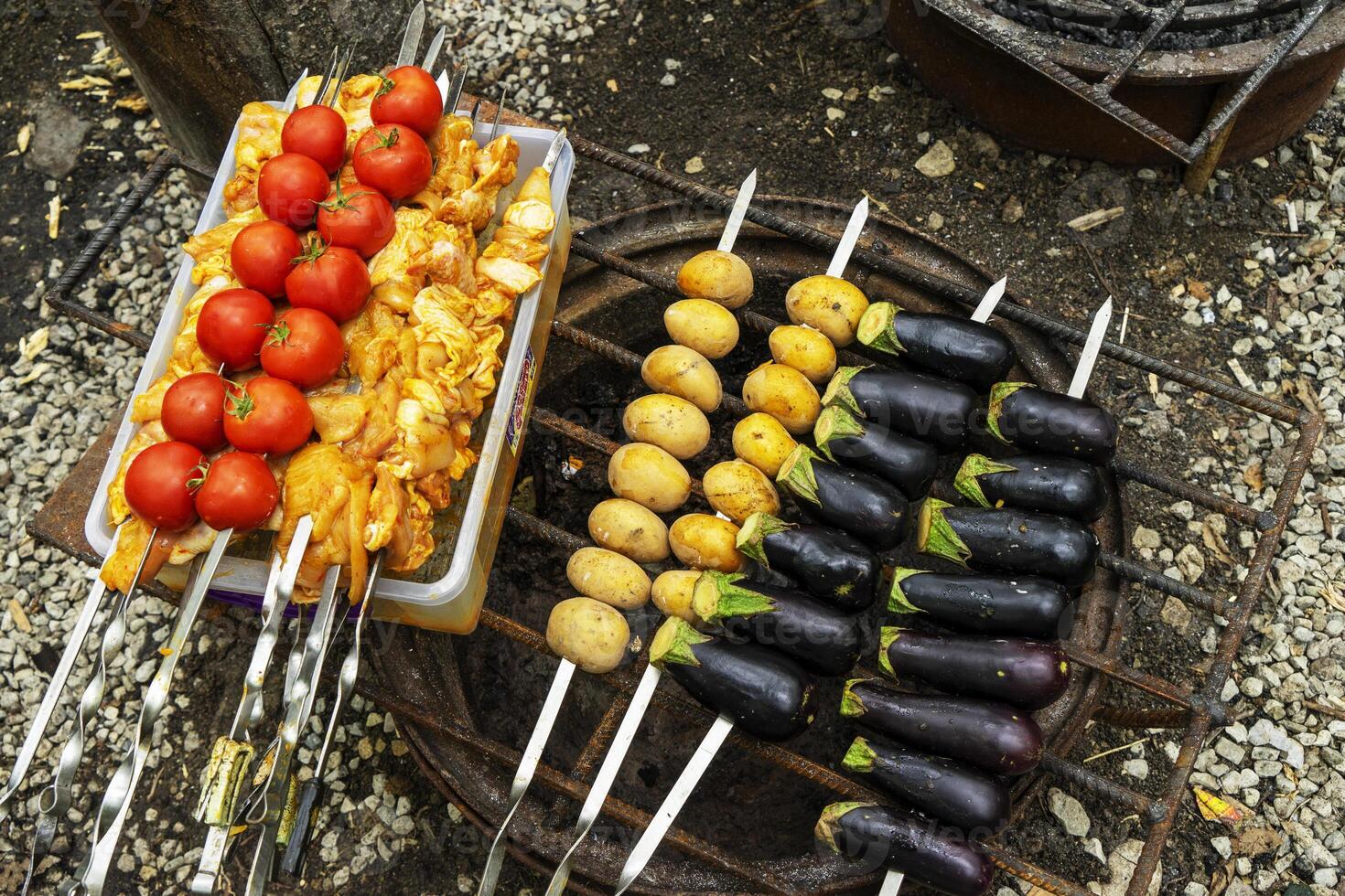delicious grilled vegetables ,mushrooms, tomato, zucchini, potato photo
