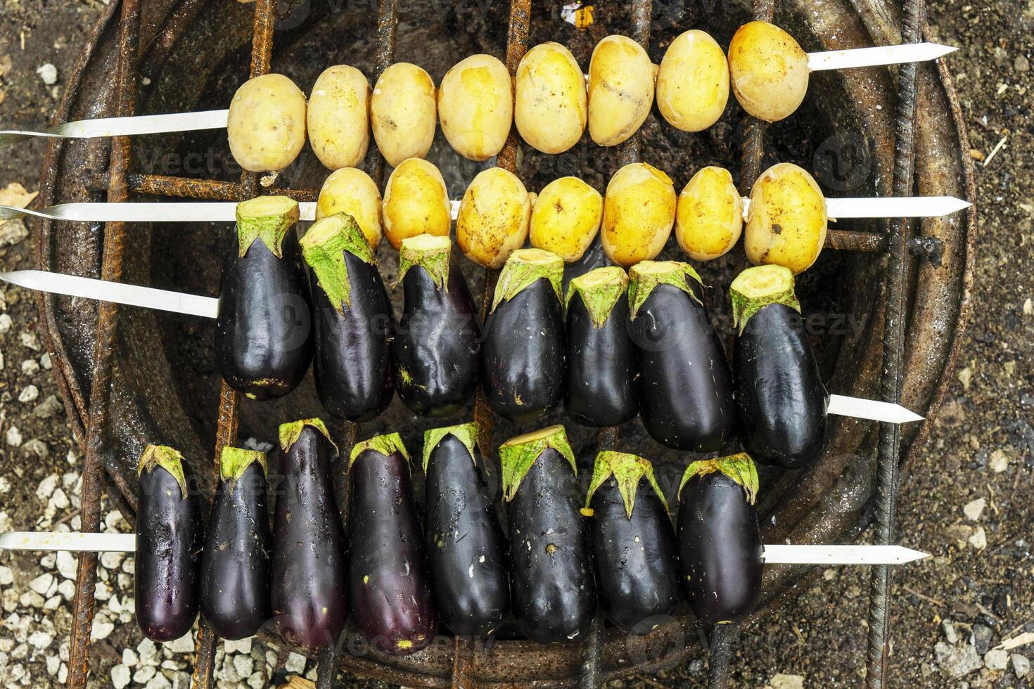 delicious grilled vegetables ,mushrooms, tomato, zucchini, potato photo