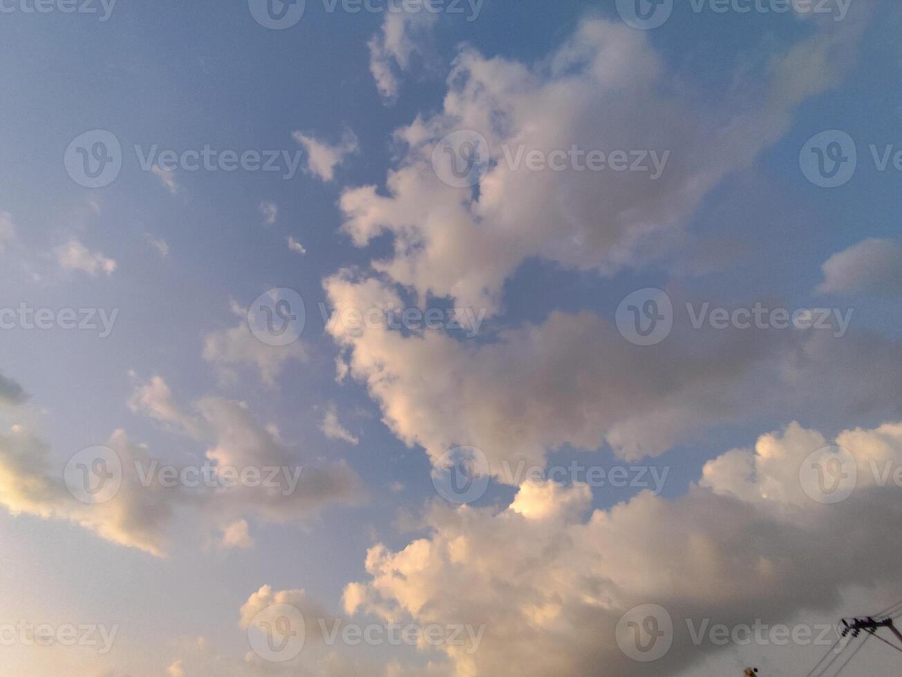 clouds in the blue sky at sunset time, beautiful nature background photo