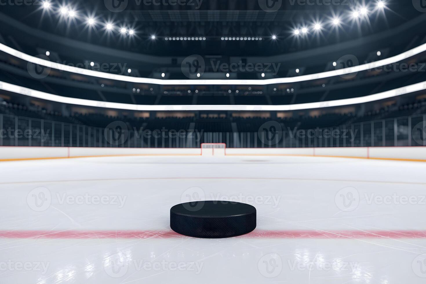 Hockey puck on ice, arena illuminated under bright lights, empty seats visible photo